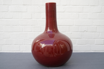 Three Chinese sang-de-boeuf-glazed bottle vases, 20th C.
